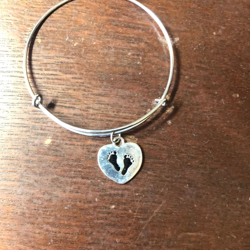Silver bracelet one‎ charm baby foot prints